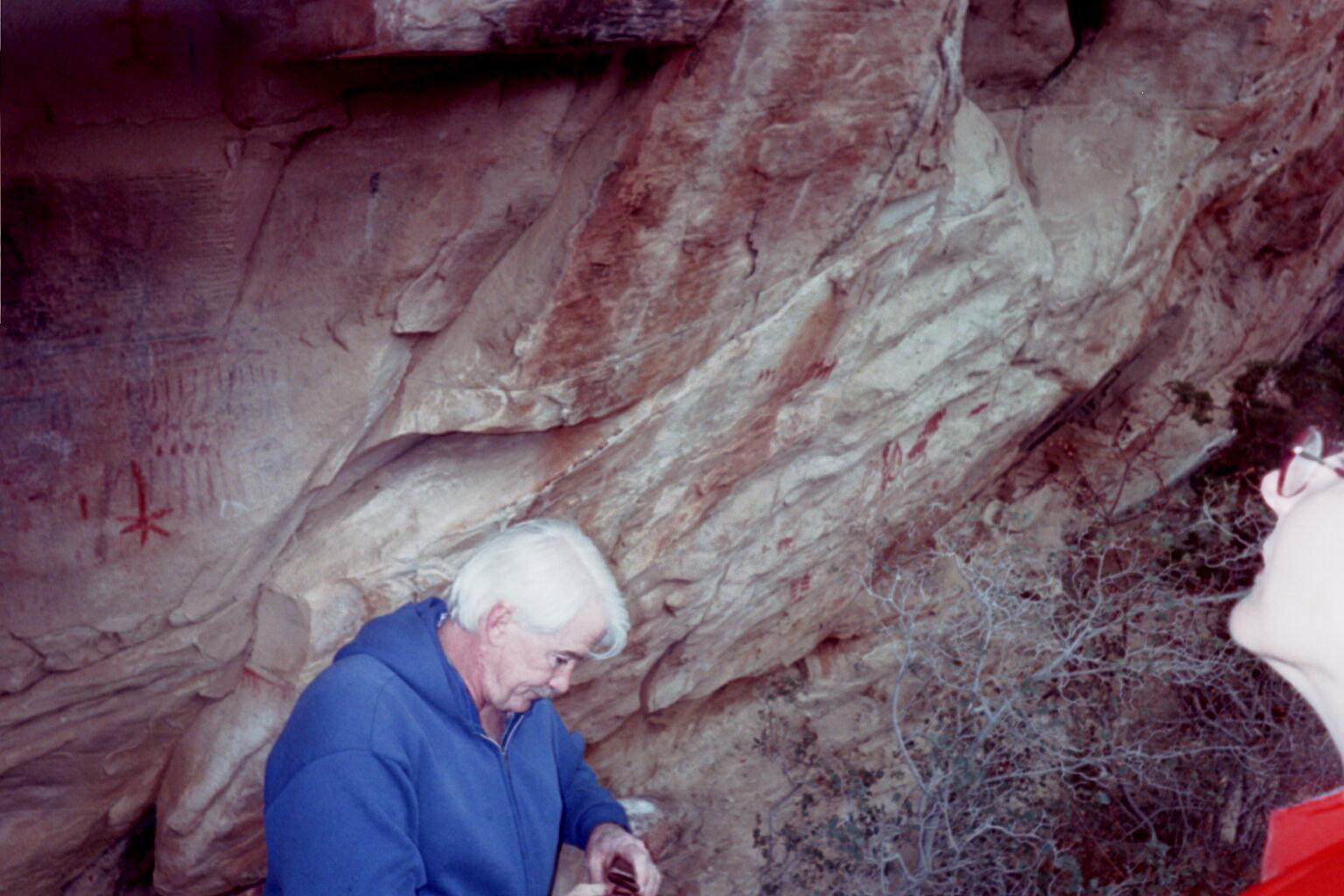 Side view of petroglyphs on cliff